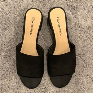 Black heeled mules